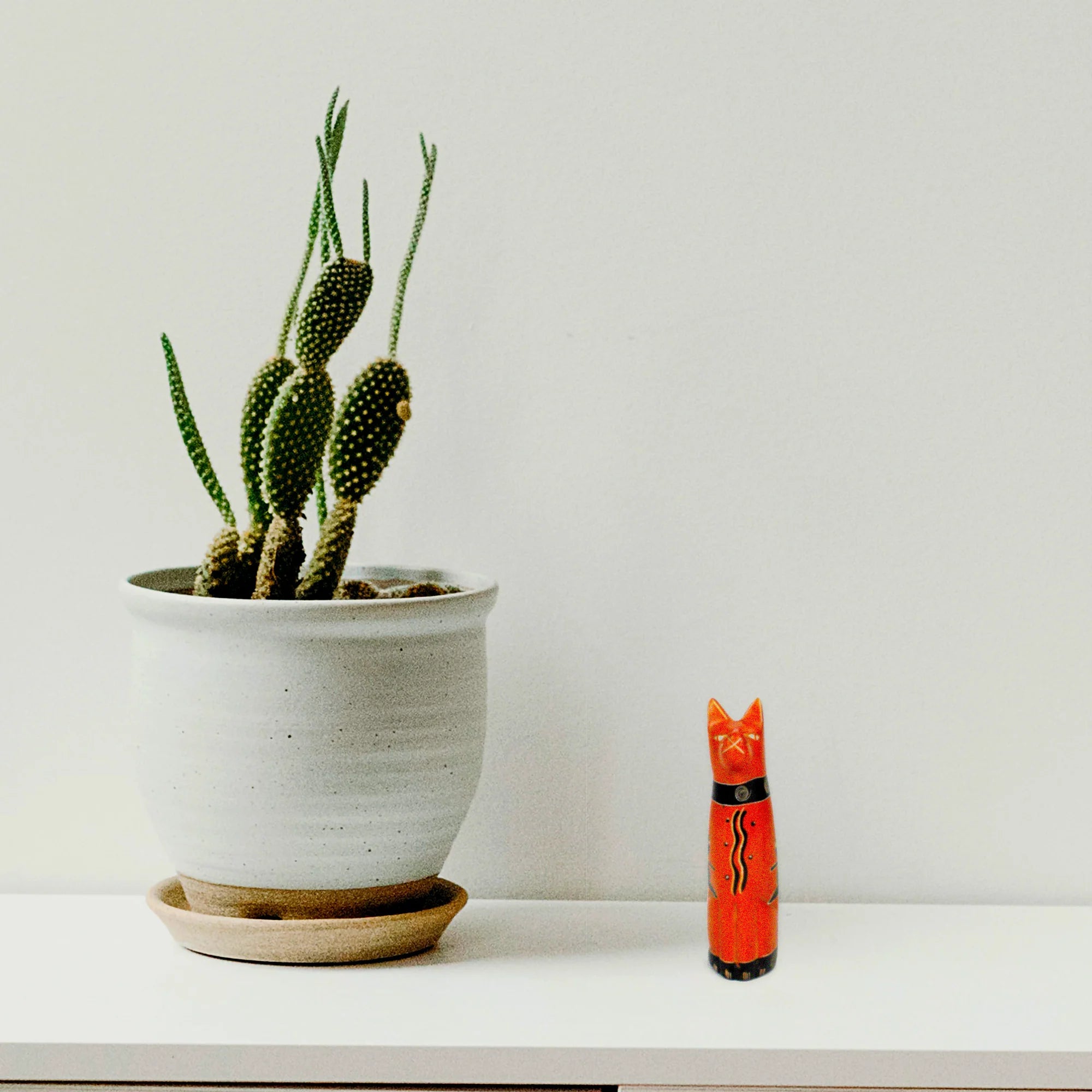 Handcrafted 5-inch Soapstone Sitting Cat Sculpture in Orange - Smolart